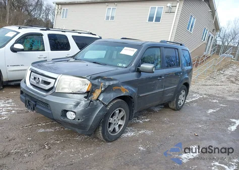 2009 Honda Pilot Touring z USA, uszkodzony, nr VIN 5FNYF48989B029448